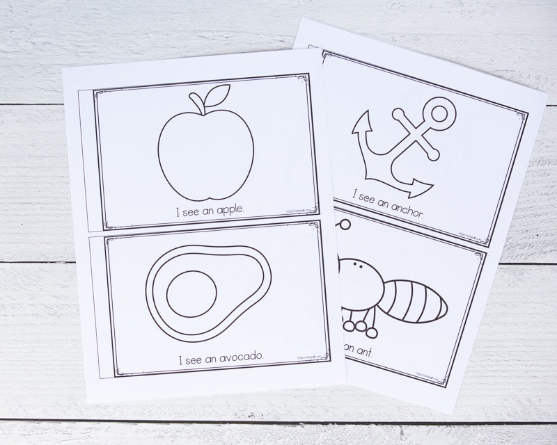 Two printed pages from a printable coloring book with letter a beginning sound words. Each page has two sheets to cut apart and form a book. Images include apple, avocado, anchor, and ant
