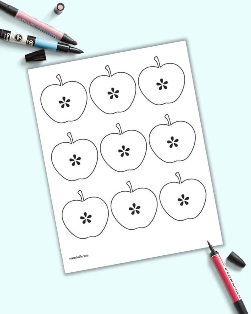 A preview of nine small apple templates on one page. Each apple is cut in half to show seeds