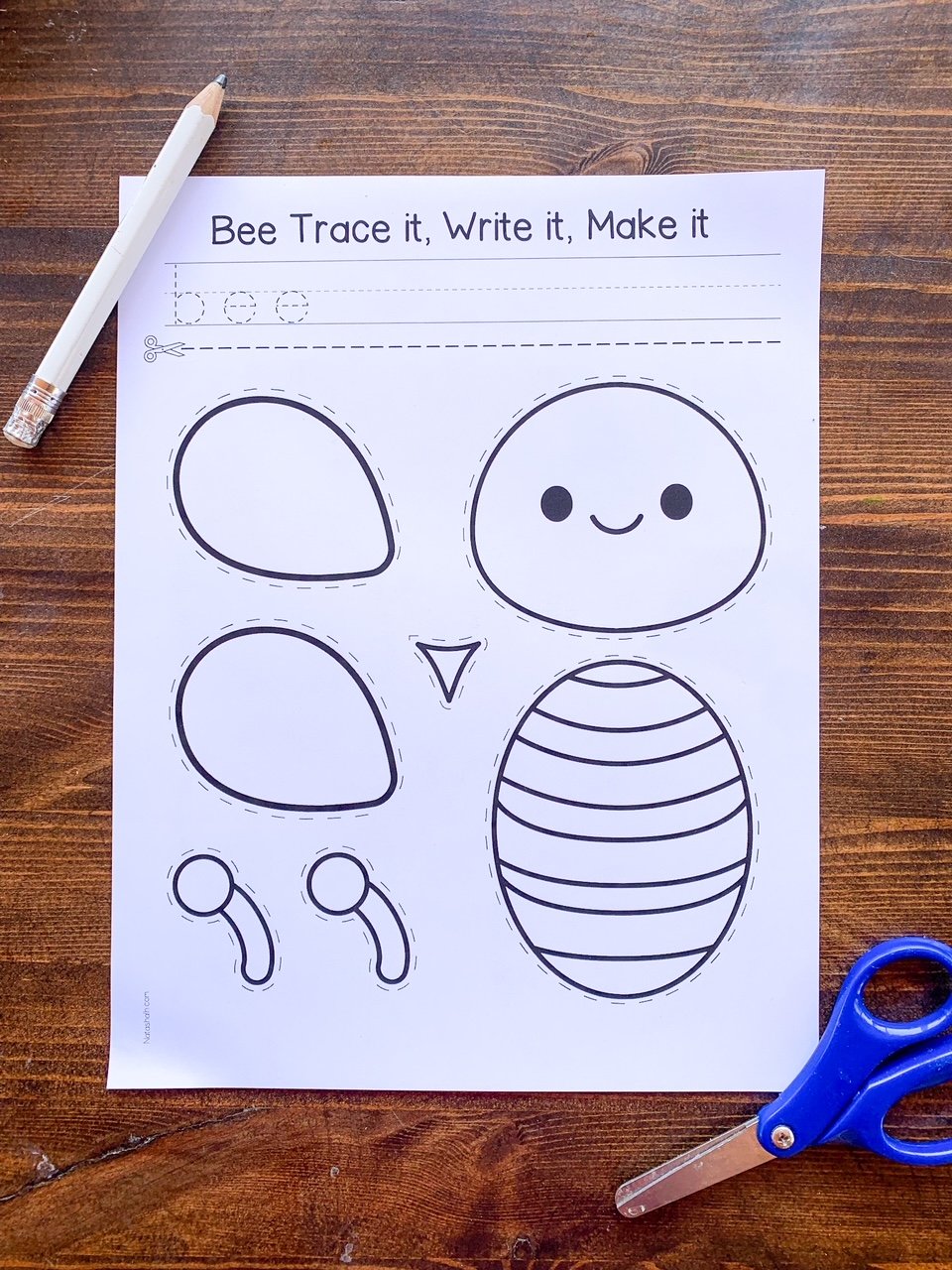 A top down photo of a printable bee cut and paste craft