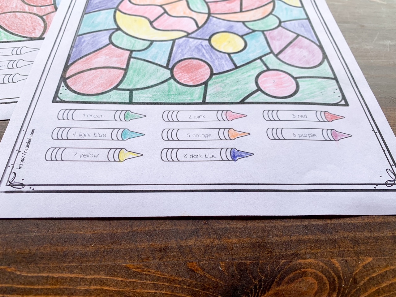 color by number page with crayon tips colored to make a key