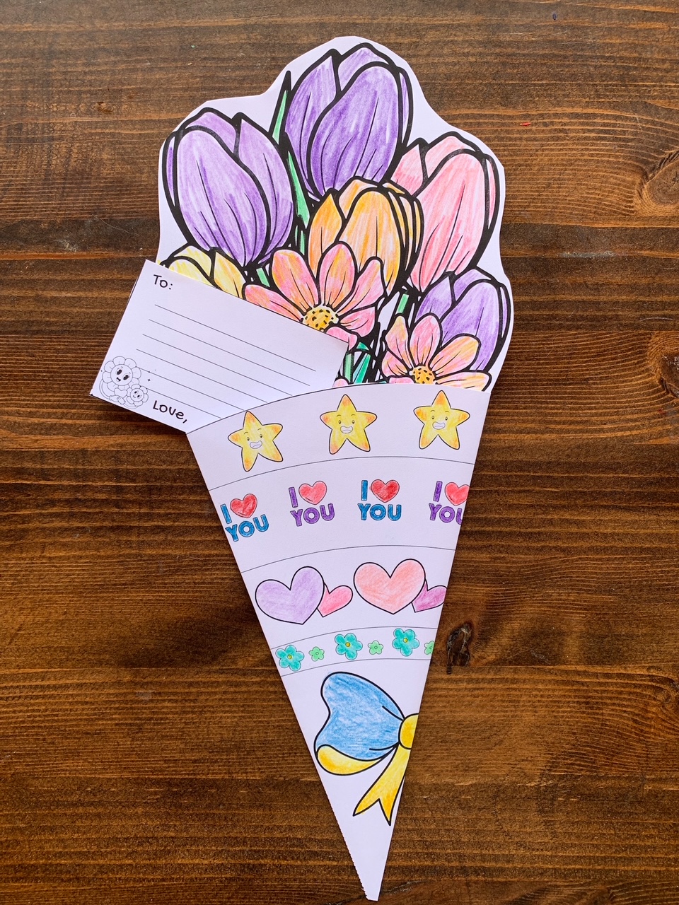 A colored and completed paper flower bouquet card for Mother's Day