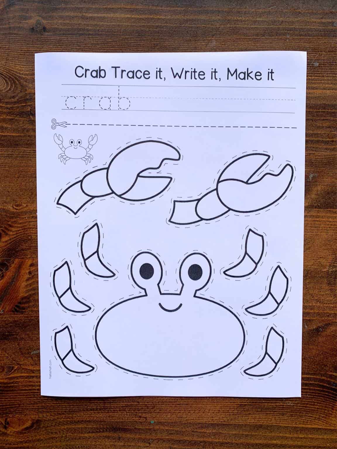 A photograph of a printed black and white crab craft template 