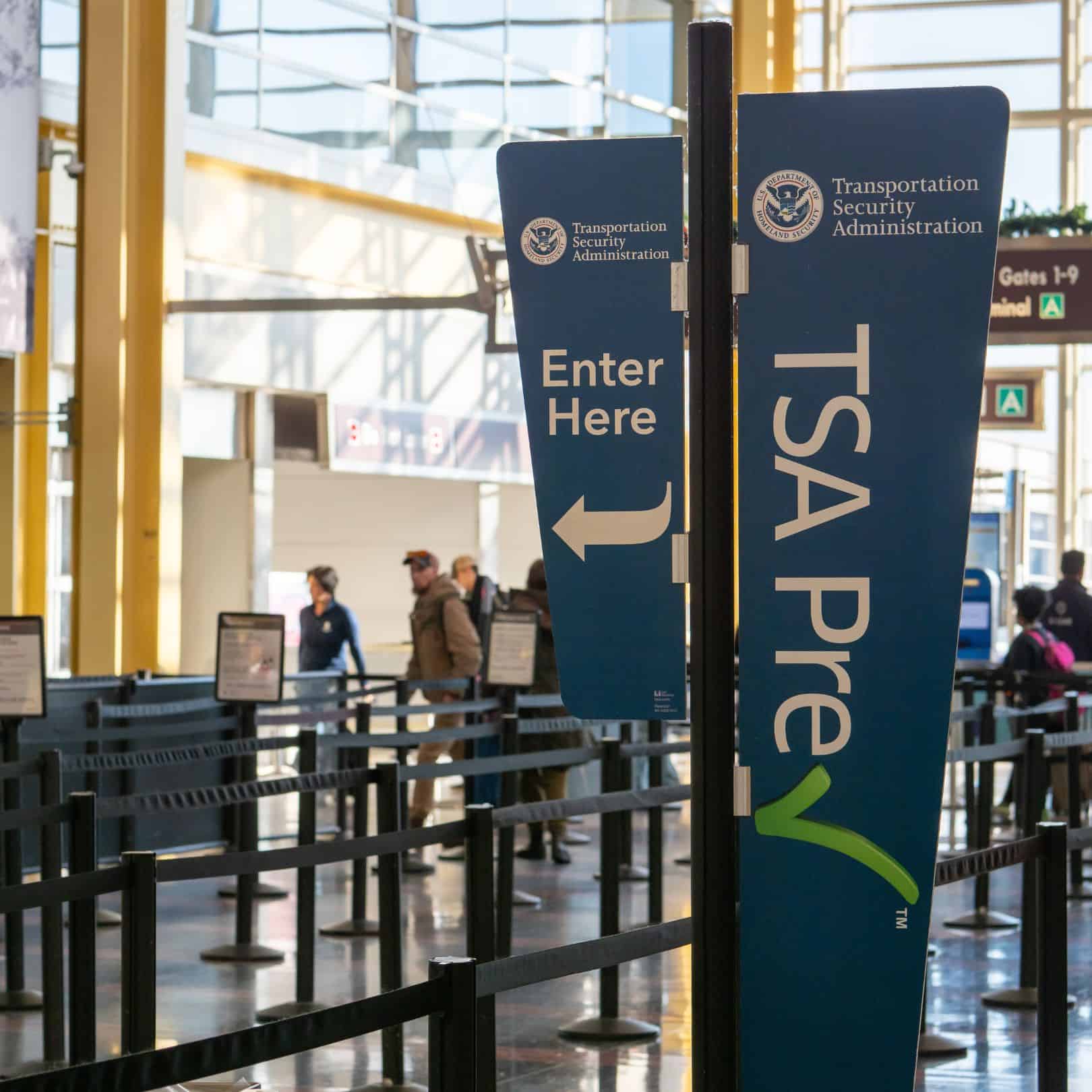 A photograph of TSA line entry signs