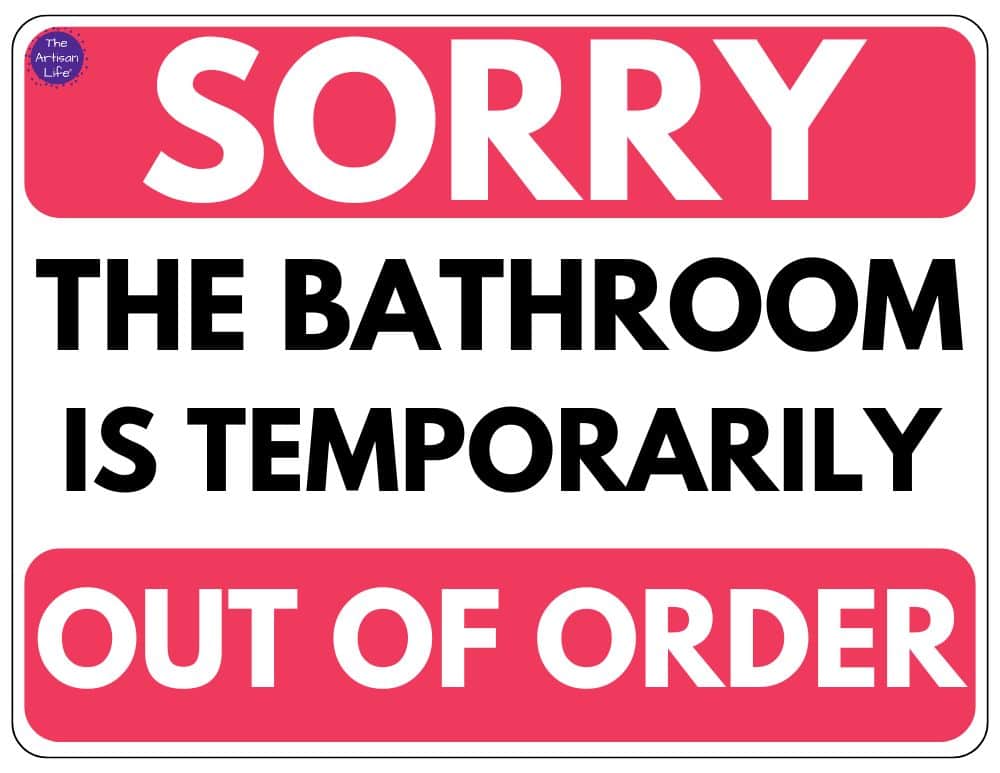 a sign reading sorry the bathroom is temporarily out of order with black and red lettering