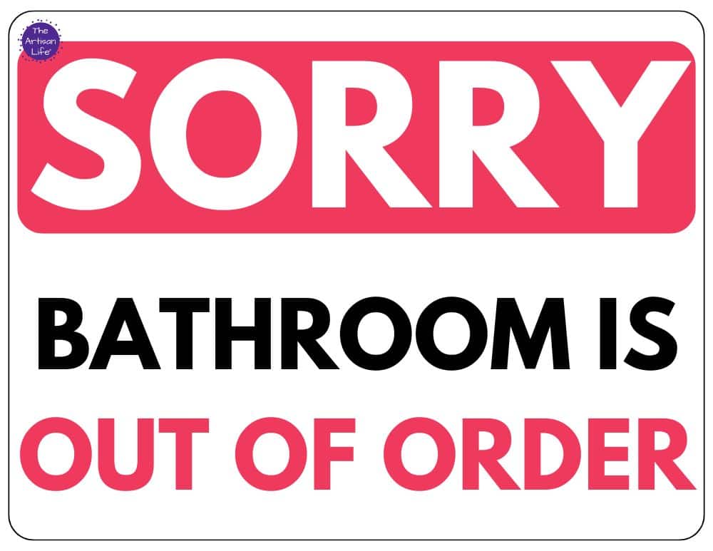 a sign reading sorry bathroom is out of order with black and red lettering