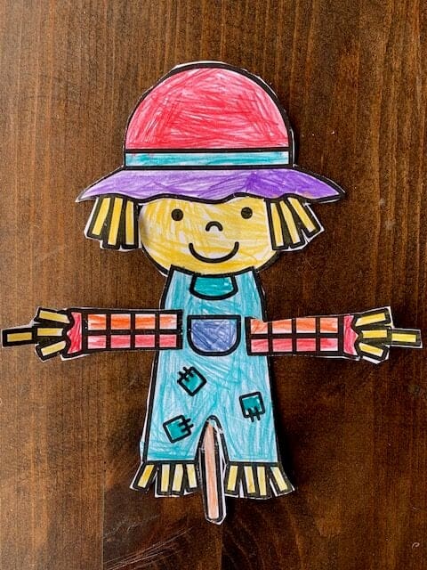 A top down photo of a child-completed scarecrow craft printable