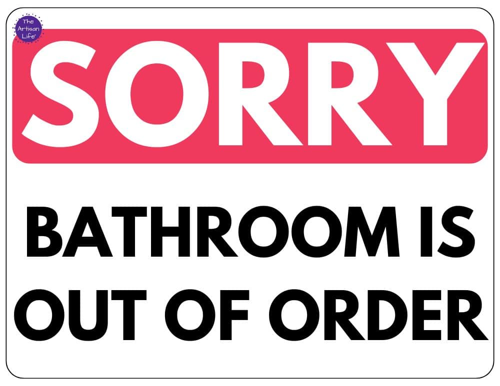 a sign reading sorry the bathroom is out of order with black and red letters