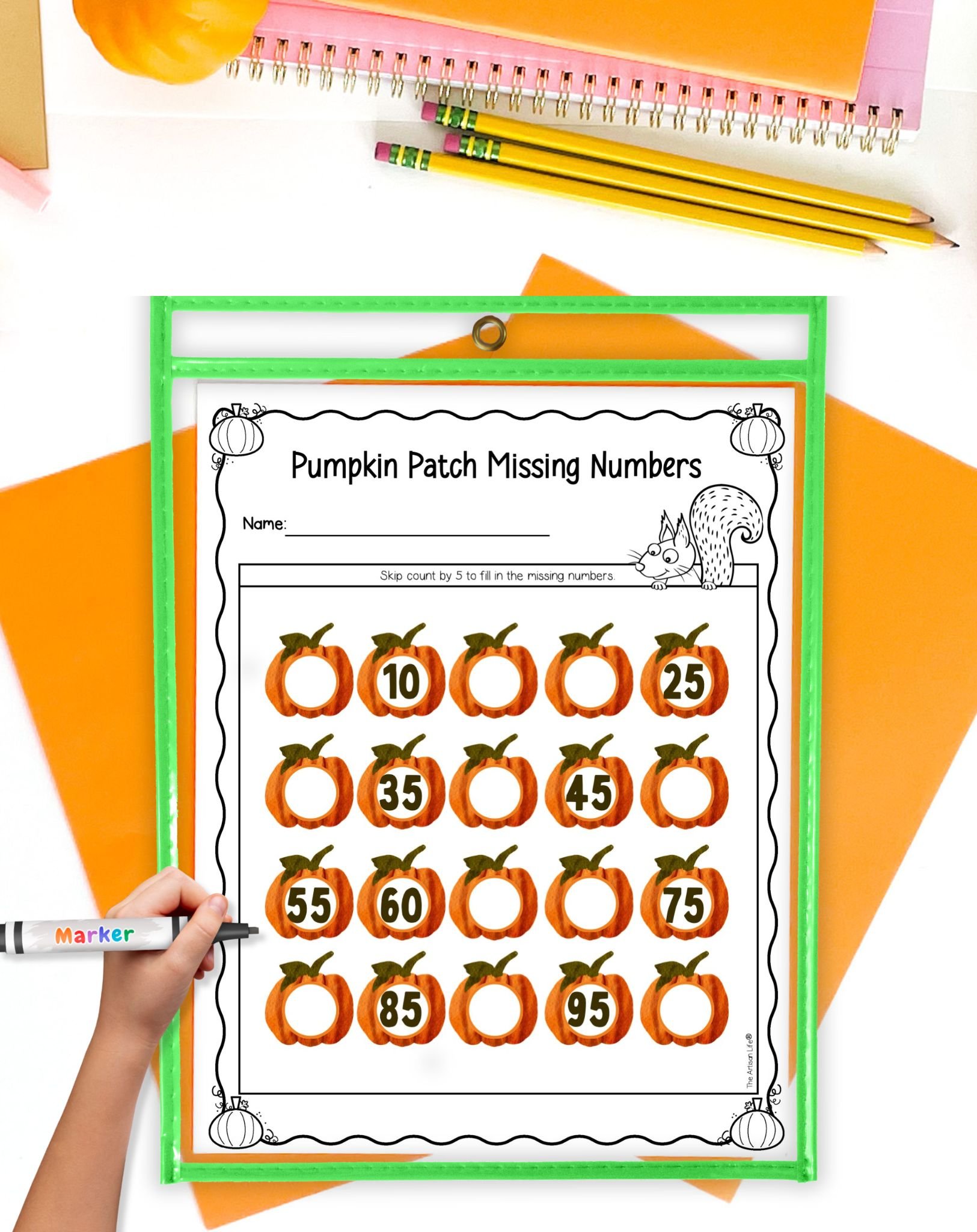 A pumpkin patch missing number counting by 10 worksheet in a dry erase pocket