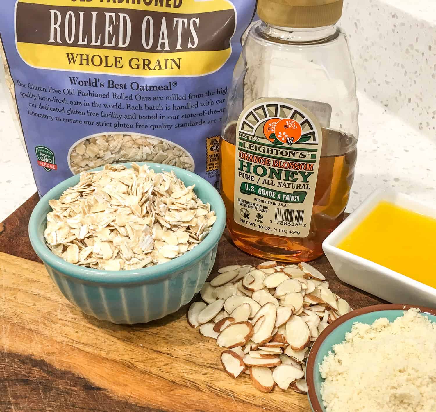 ingredients for making a apple crisp, including oatmeal and honey