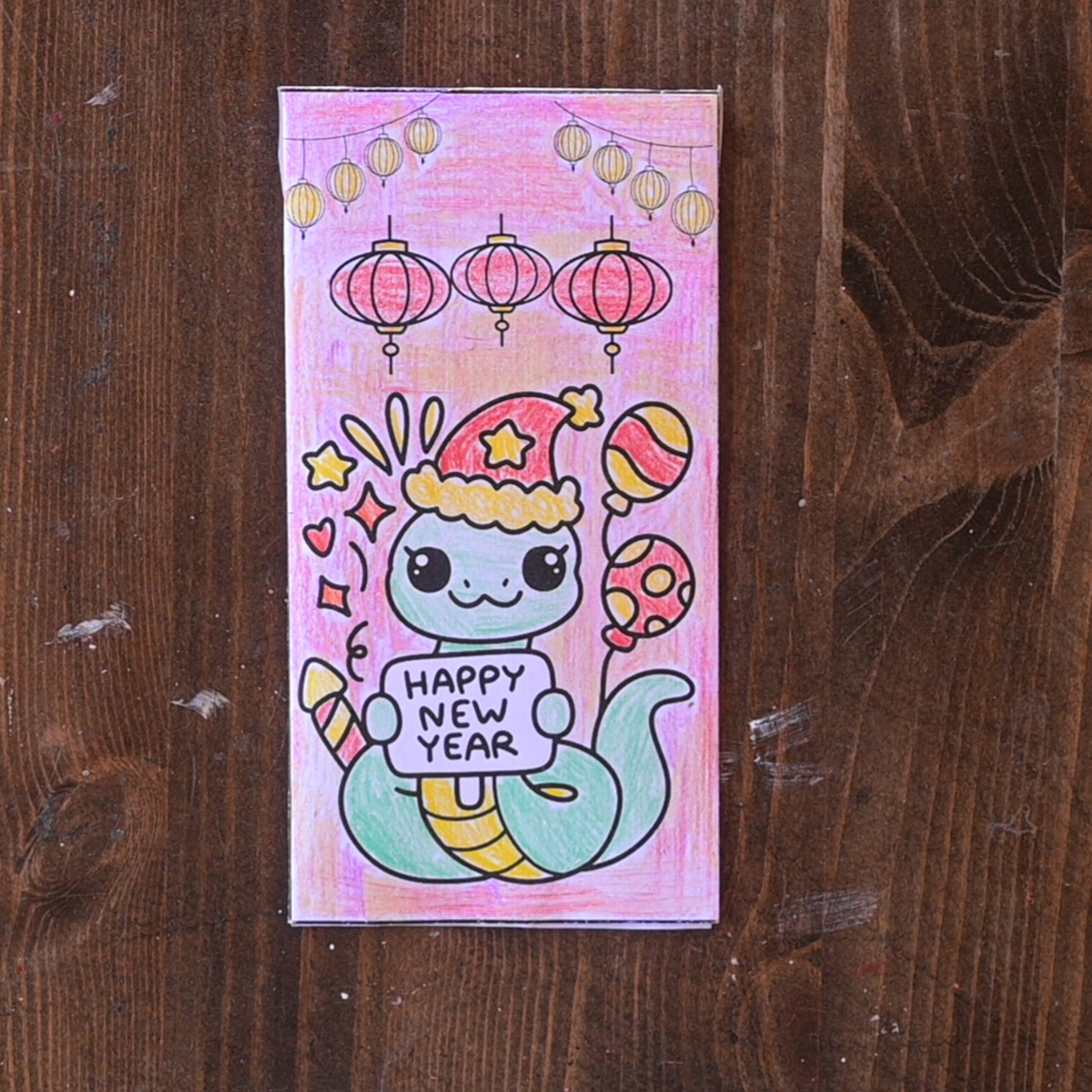 a completed year of the snake red envelope craft