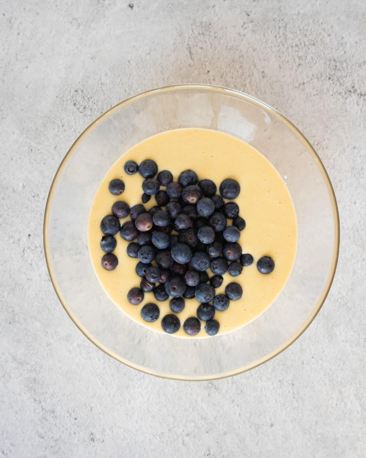 adding blueberries to gluten free pancake batter