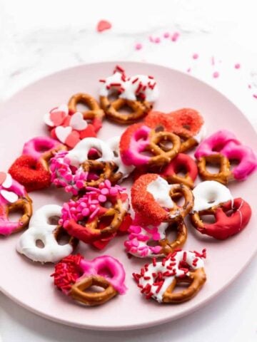 a plate with gluten free, dairy free chocolate pretzels for Valentine's Day