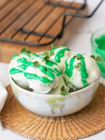 a bowl with white chocolate gluten free st patrick's day truffles