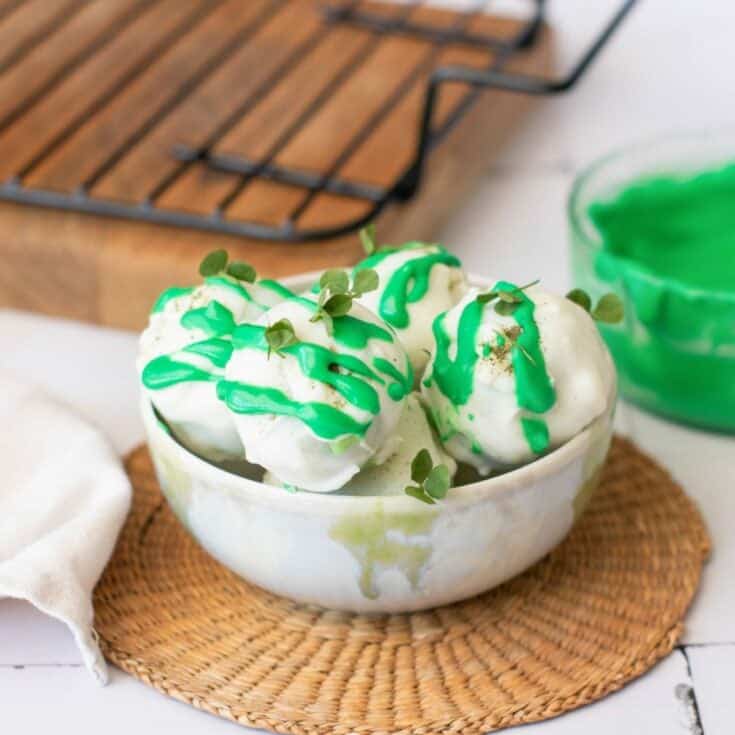 a bowl with white chocolate gluten free st patrick's day truffles