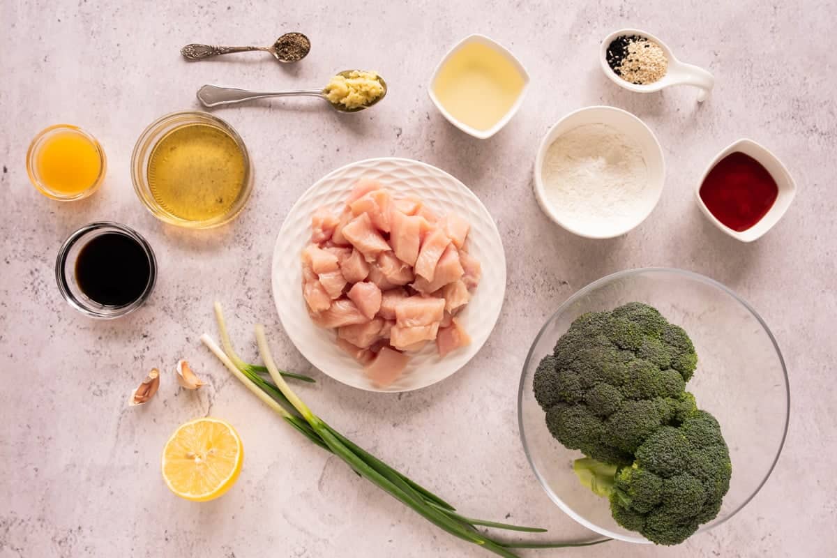 a top down photo of ingredients for making honey garlic chicken with broccoli 