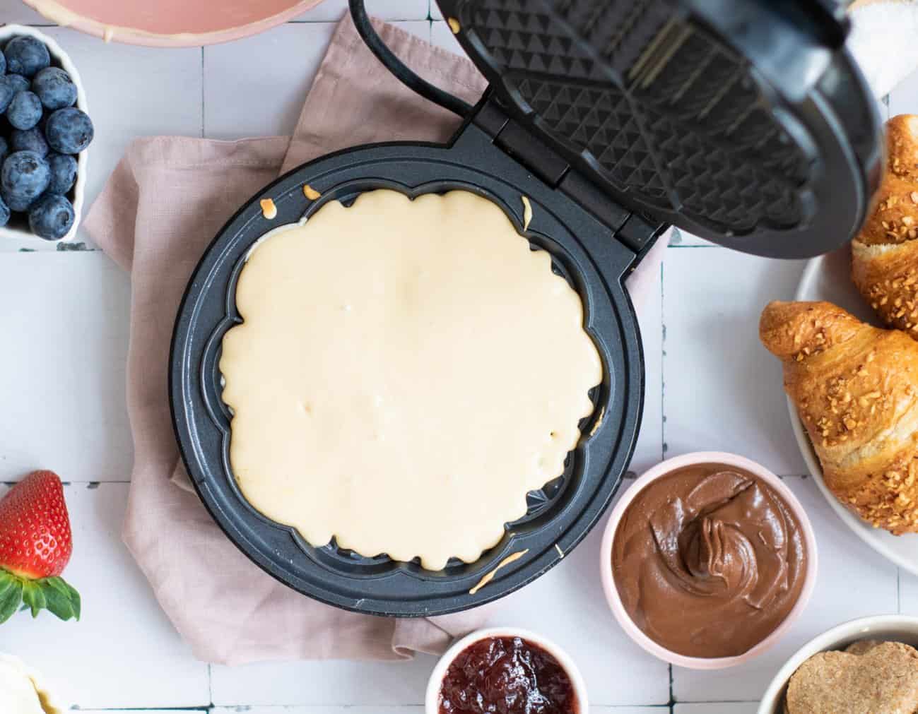 Waffle batter in a waffle maker