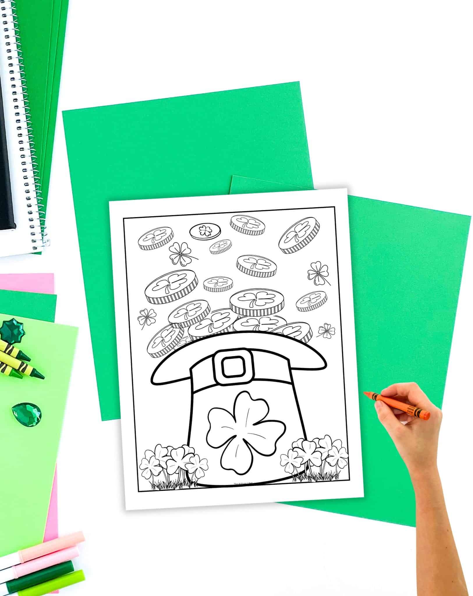 a coloring page for kids showing a leprechaun hat filled with gold coins