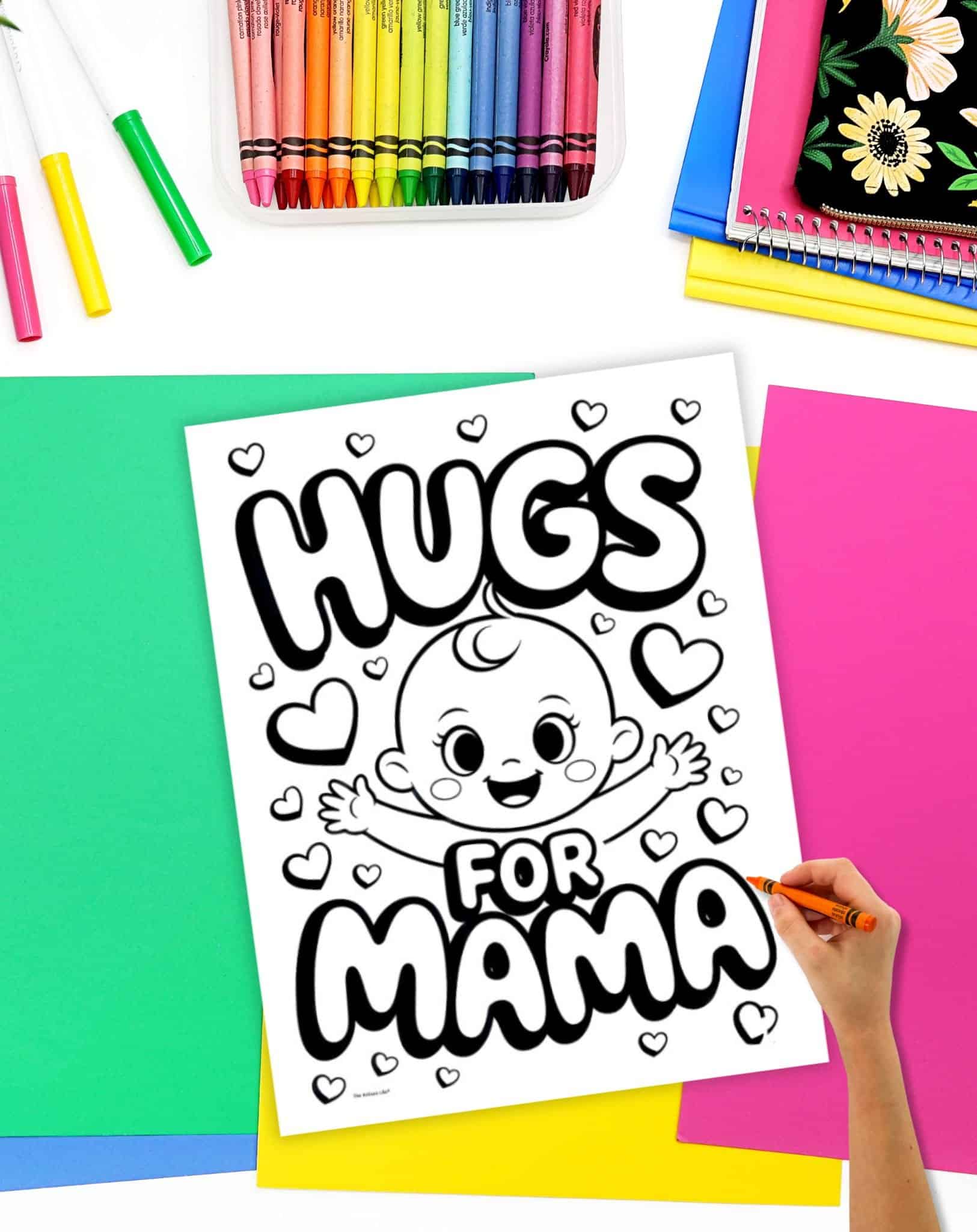 a coloring page with "hugs for mama" and a child with arms open wide is being colored by a hand with an orange crayon