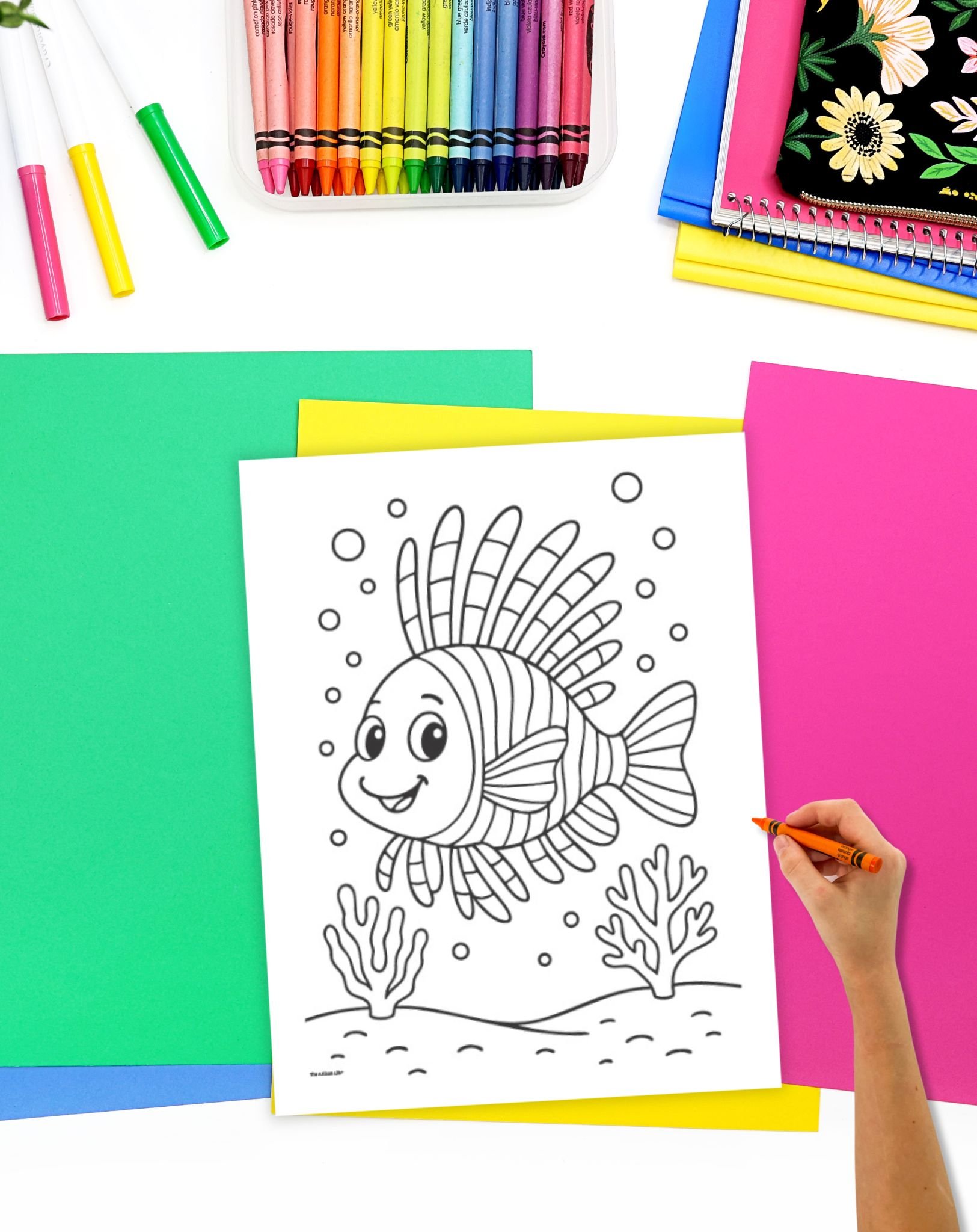A child's hadn't coloring a bold and easy lion fish coloring page