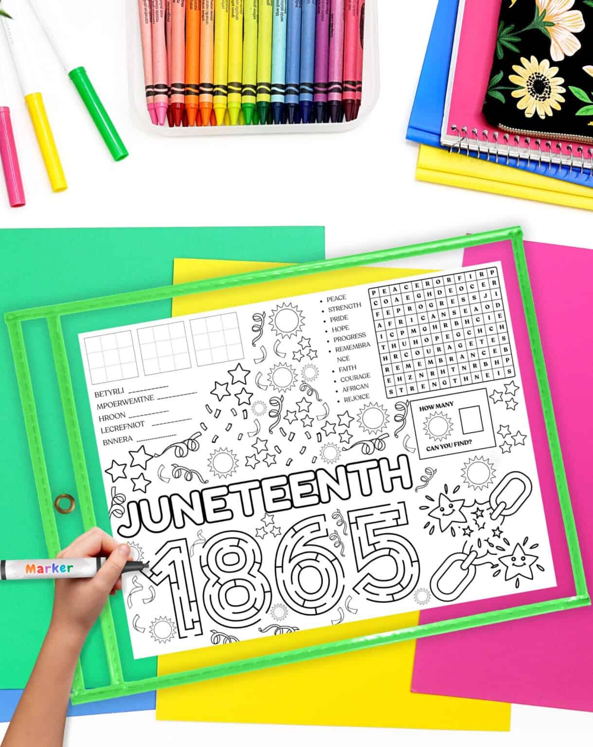 A hand holding a marker colors a printable Juneteenth activity featuring the year "1865," surrounded by colorful crayons and various sheets of paper, representing engaging Juneteenth lesson plans and activities for kids.
