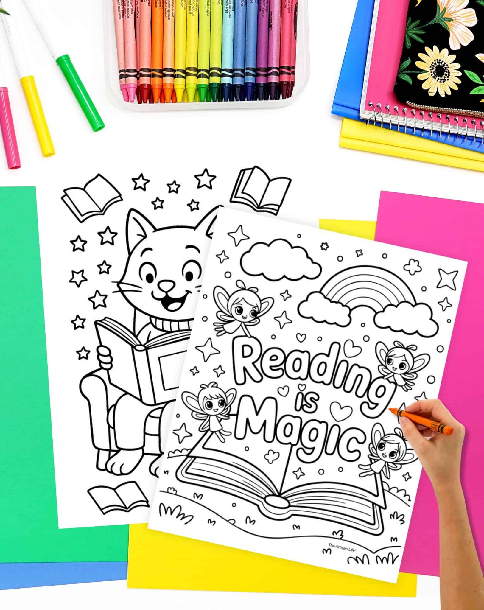two reading coloring pages about to be colored by a hand holding an orange crayon.