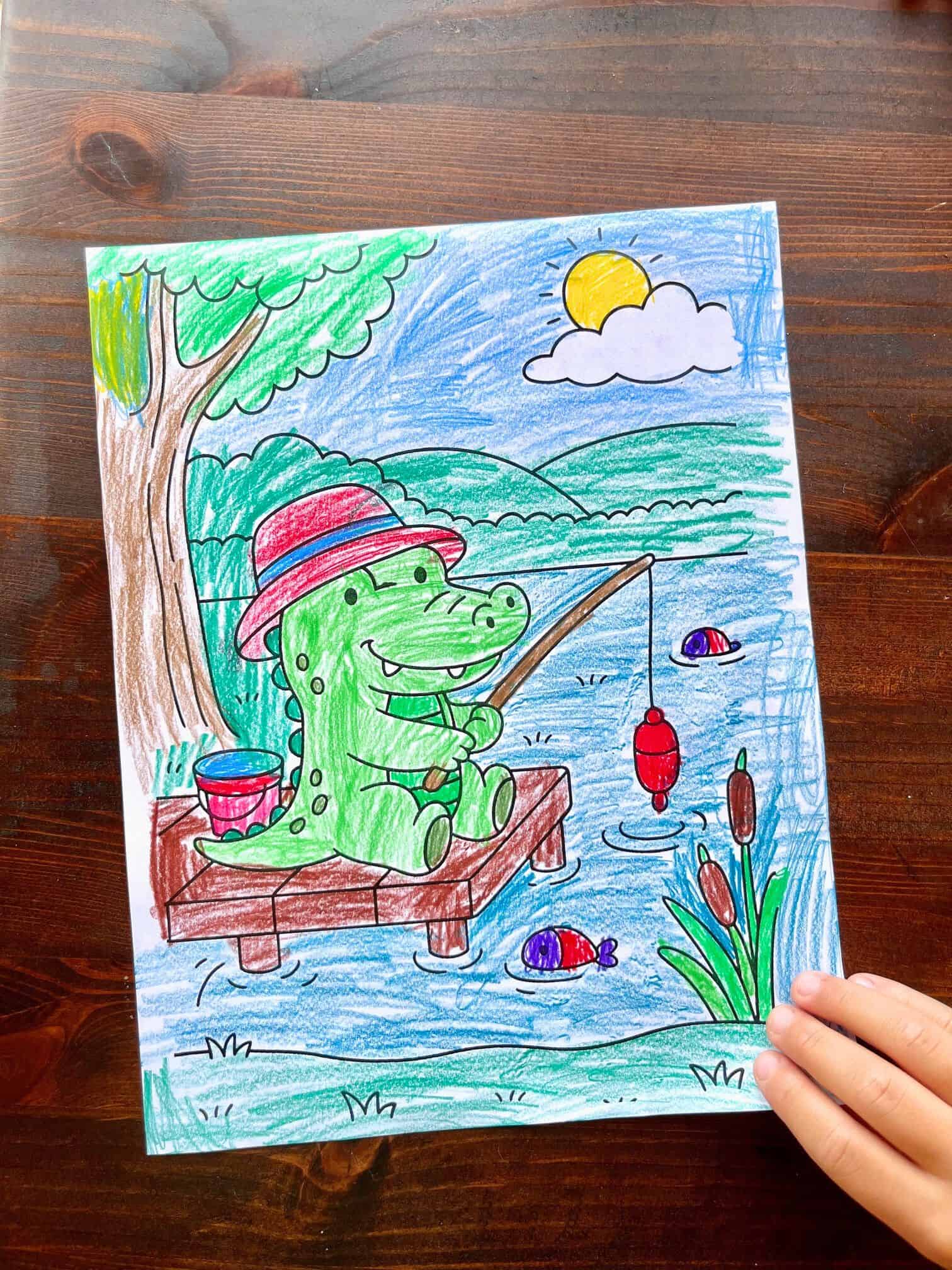 A colorful drawing shows a green crocodile in a red hat fishing from a wooden dock by a lake, surrounded by trees and fish, featuring themes suitable for comfy days coloring pages and cozy animals coloring book.
