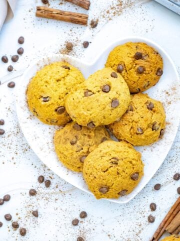 a plate of chocolate chip pumpkin cookies