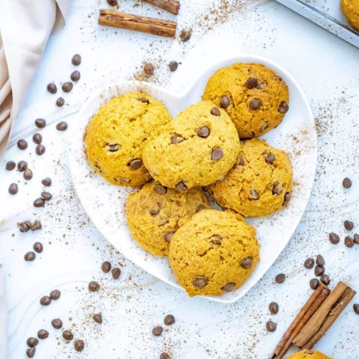 a plate of chocolate chip pumpkin cookies