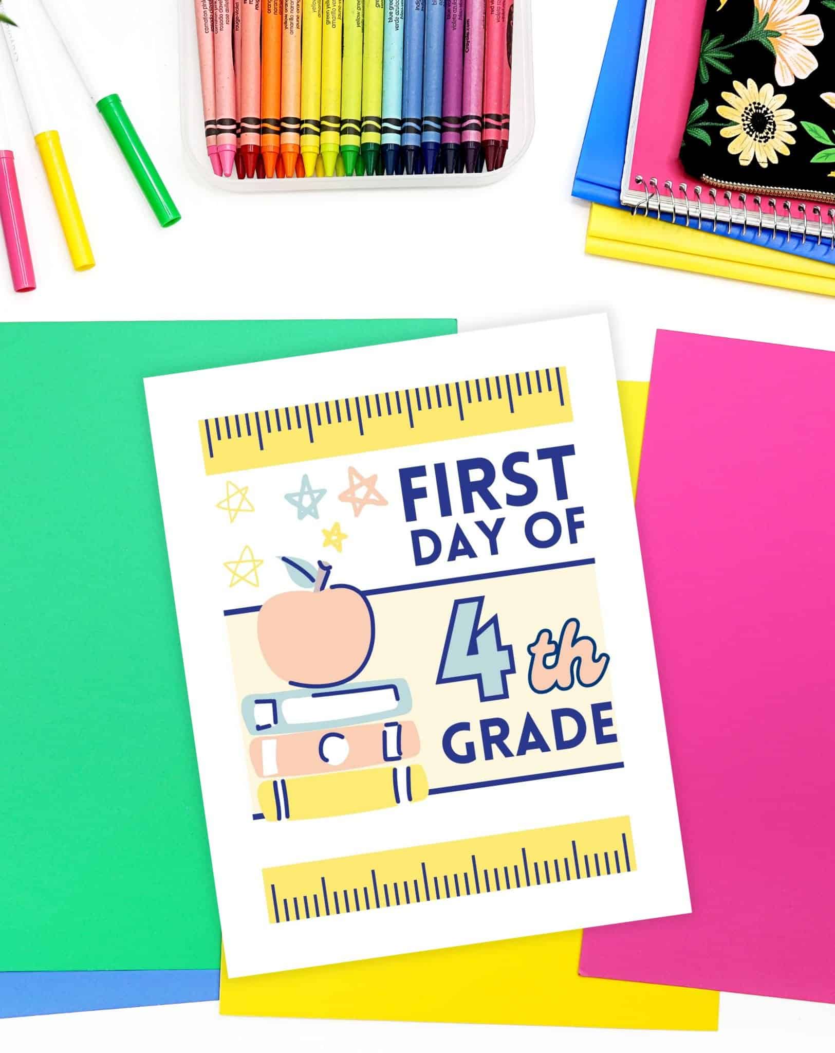 a frist day of 4th grade sign on colorful papers