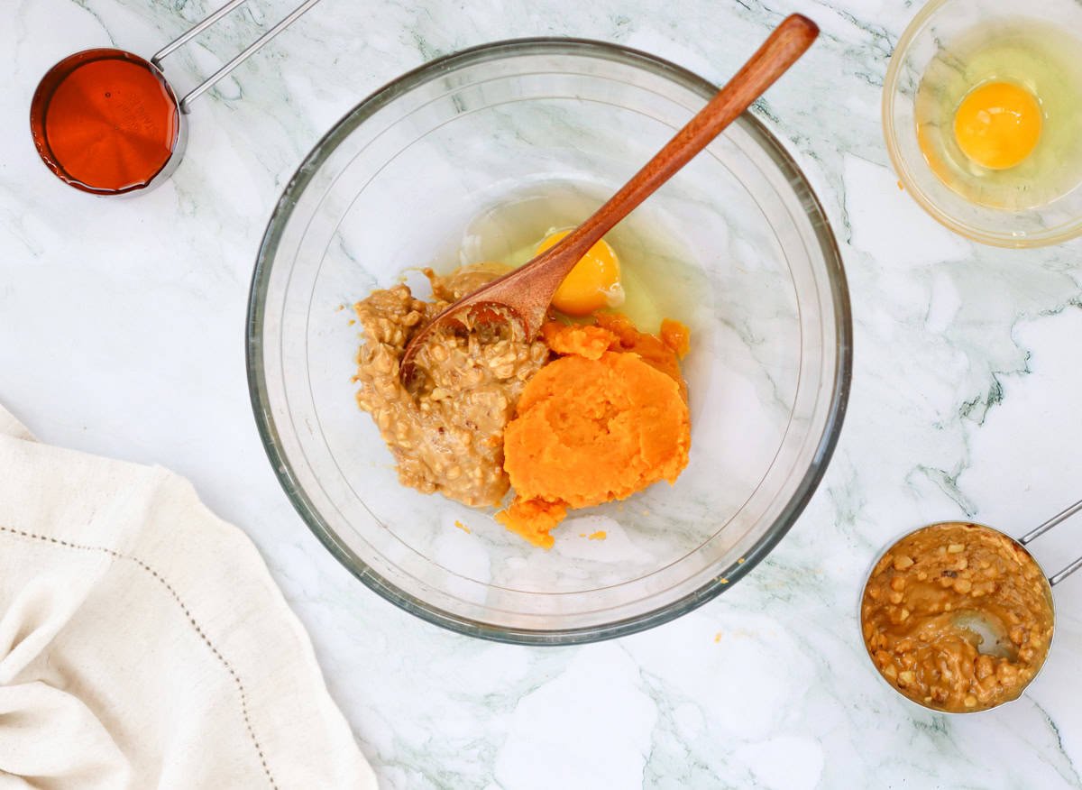 mixing wet ingredients for sweet potato brownies