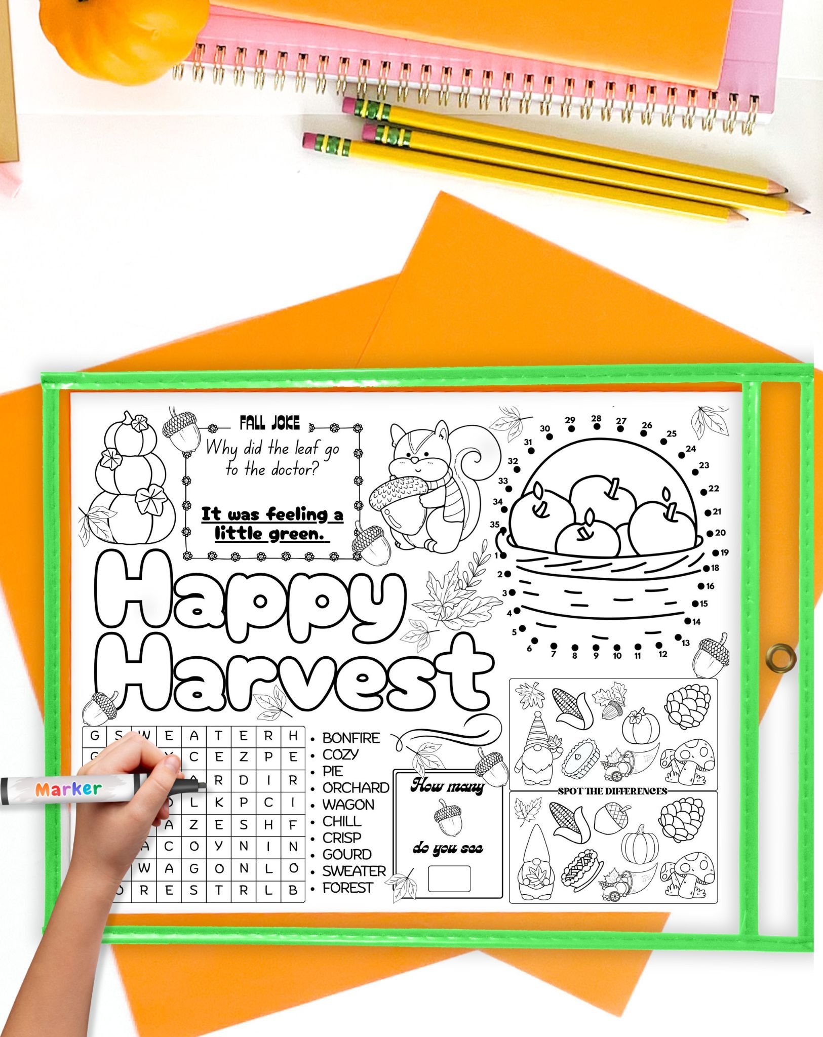 a fall harvest placemat in a dry erase pocket