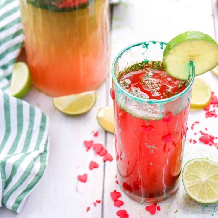 a glass with lemon lime Grinch mocktail