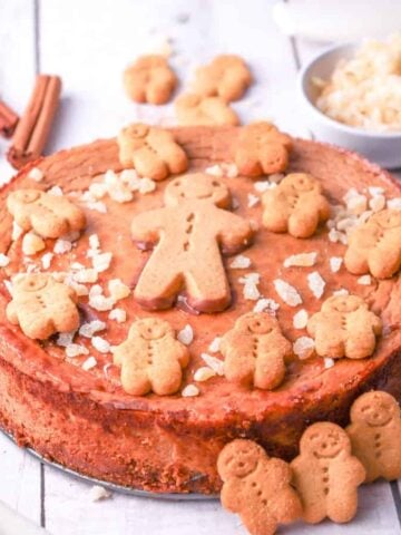 a gingerbread cheesecake topped with gingerbread cookies