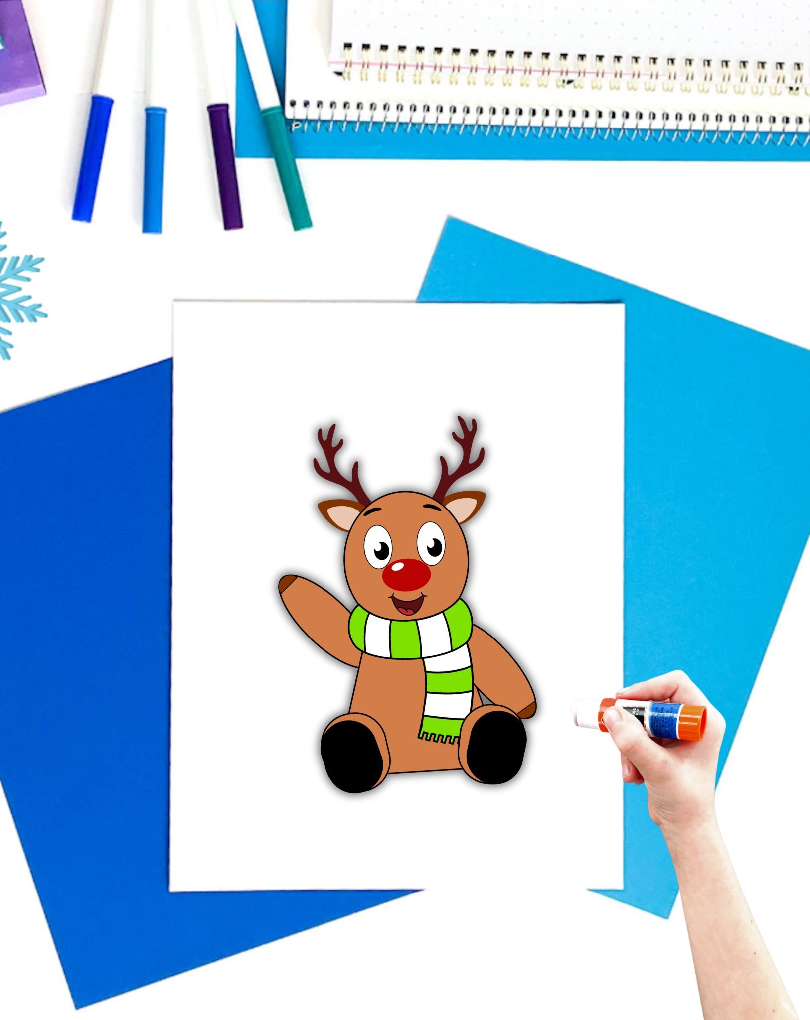a completed cut and paste build a reindeer craft