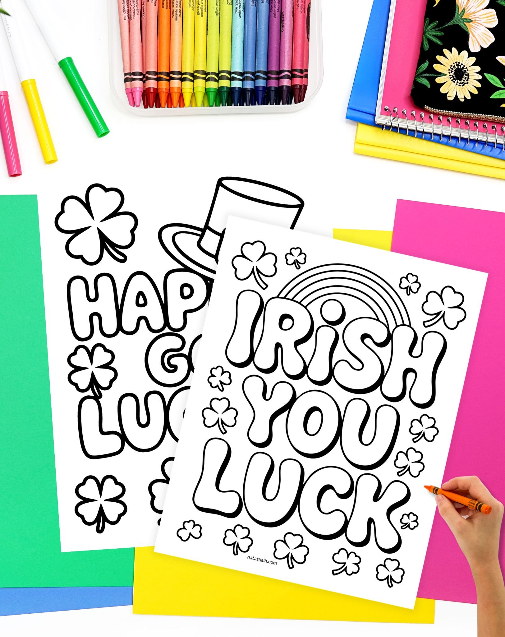 a hadn't with a crayon preparing to color easy st patrick's day coloring pages