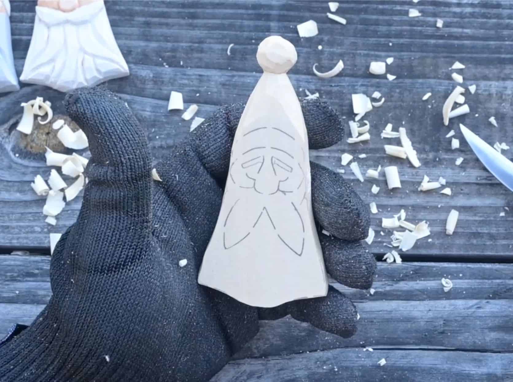 a roughed out santa carving
