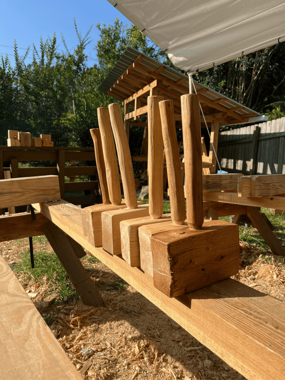 a row of wood mallets