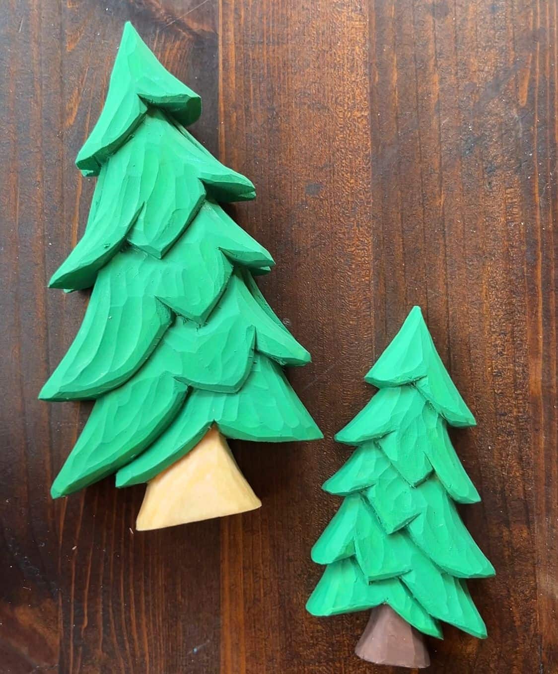 two painted wood christmas trees