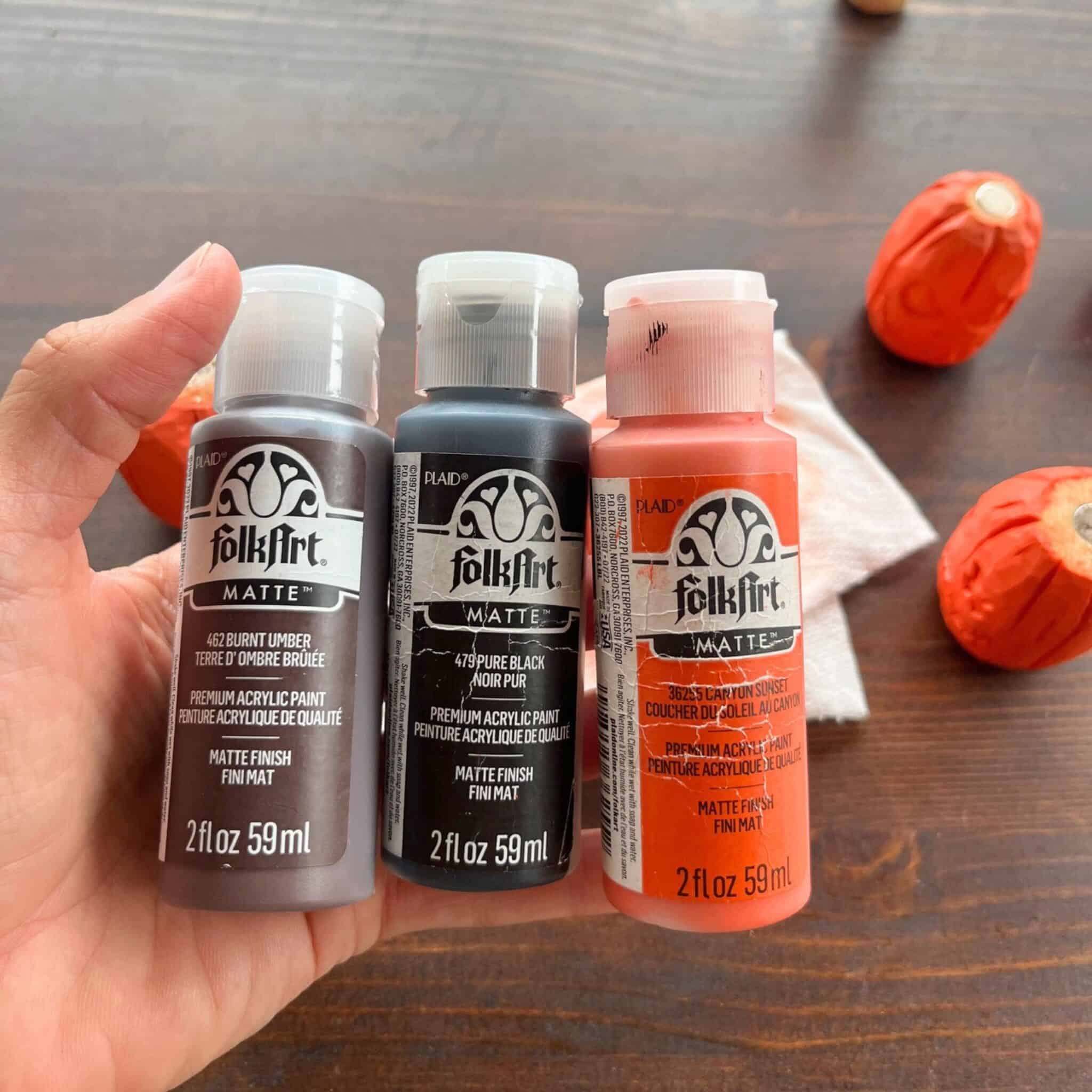 three folk art paints for painting wood carigs