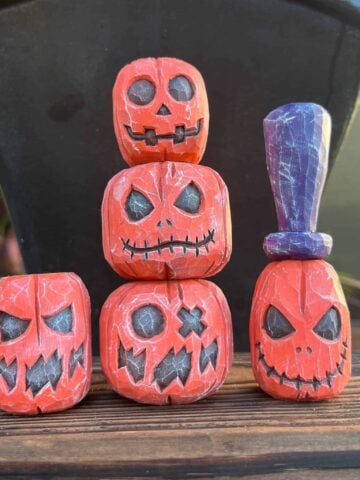 five hand carved wood jack o lanterns
