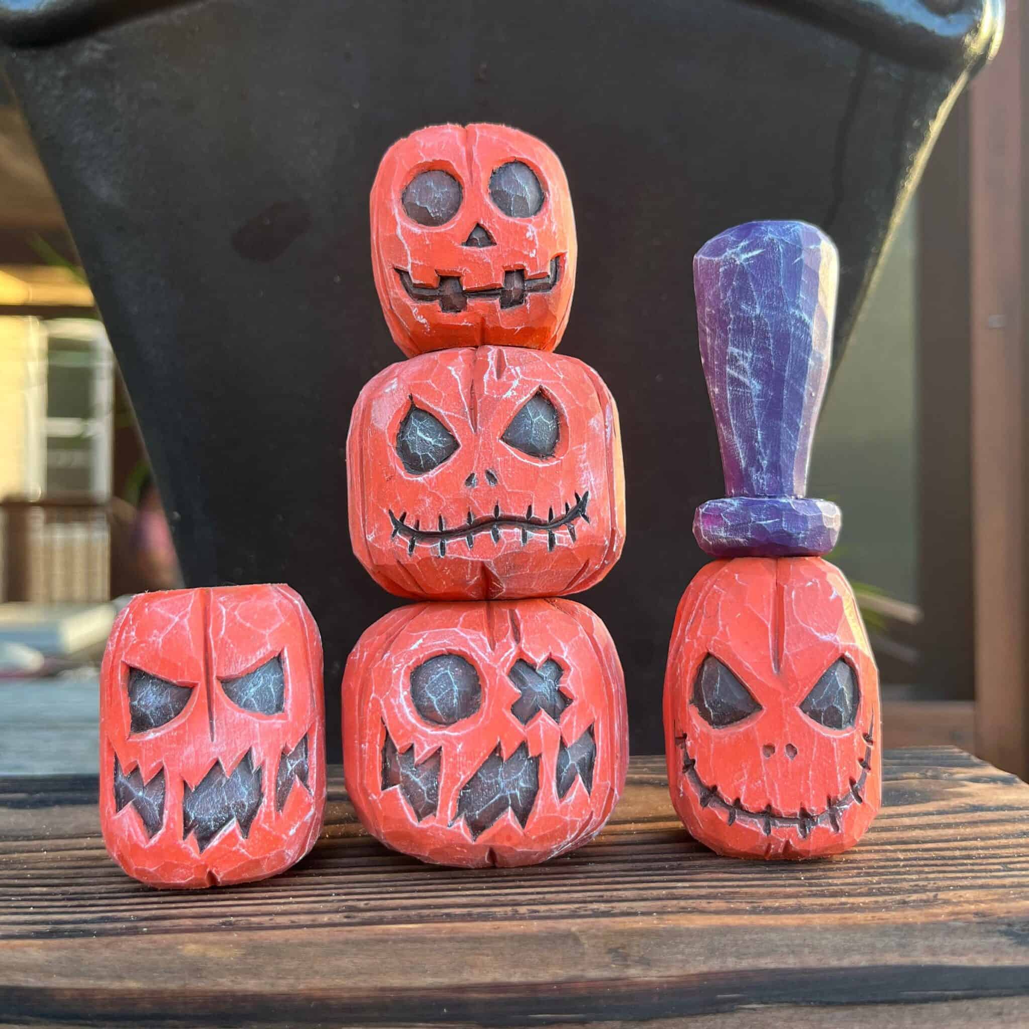 five hand carved wood jack o lanterns