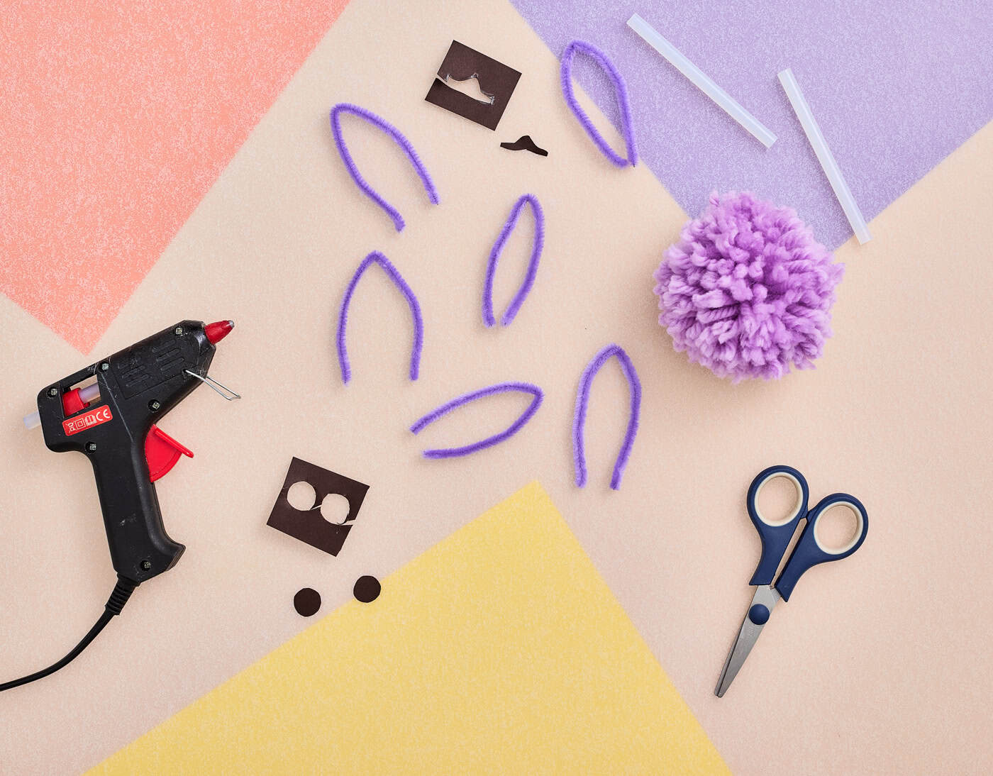 Cutting out cardboard pieces for a cute axolotl craft