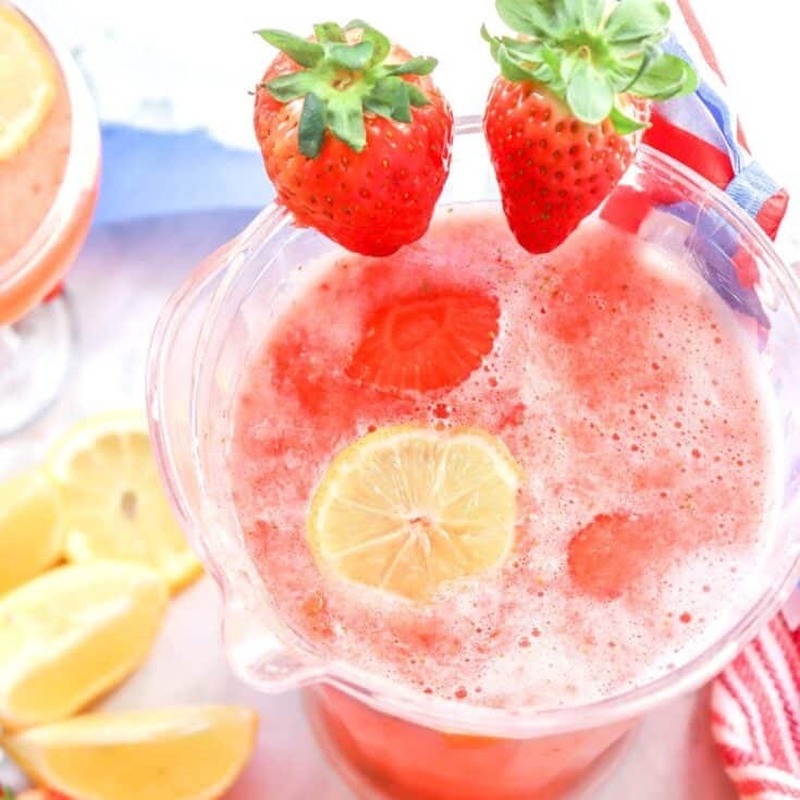 a pitcher of strawberry lemonade