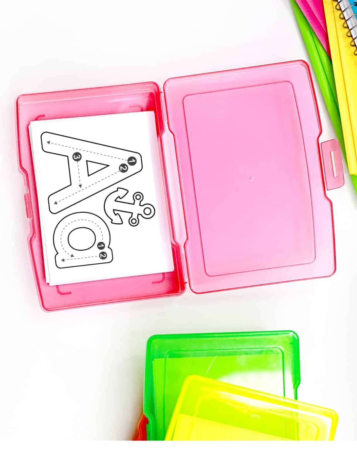 a pink task box with a letter a tracing card