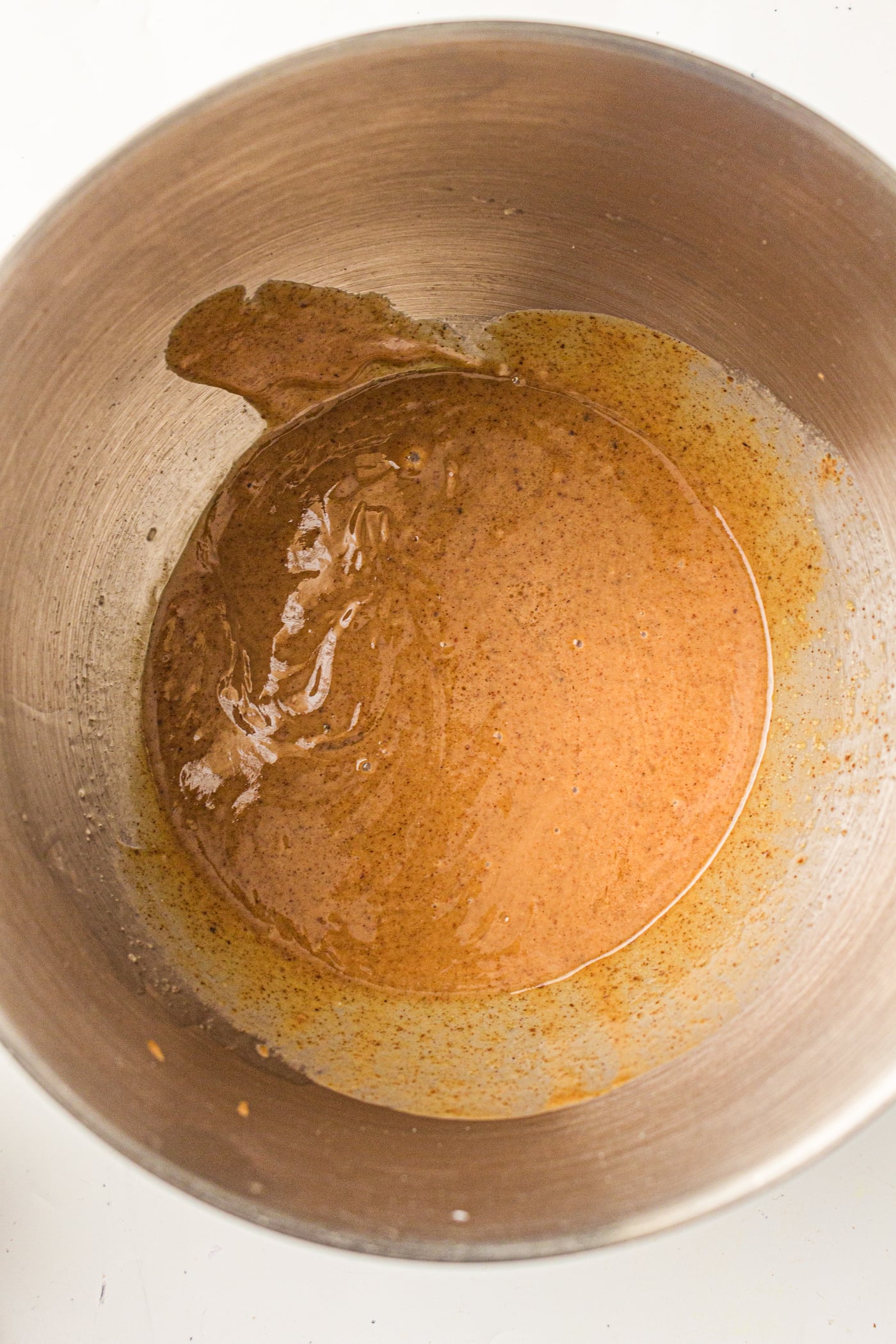combined almond lour and maple syrup in a bowl
