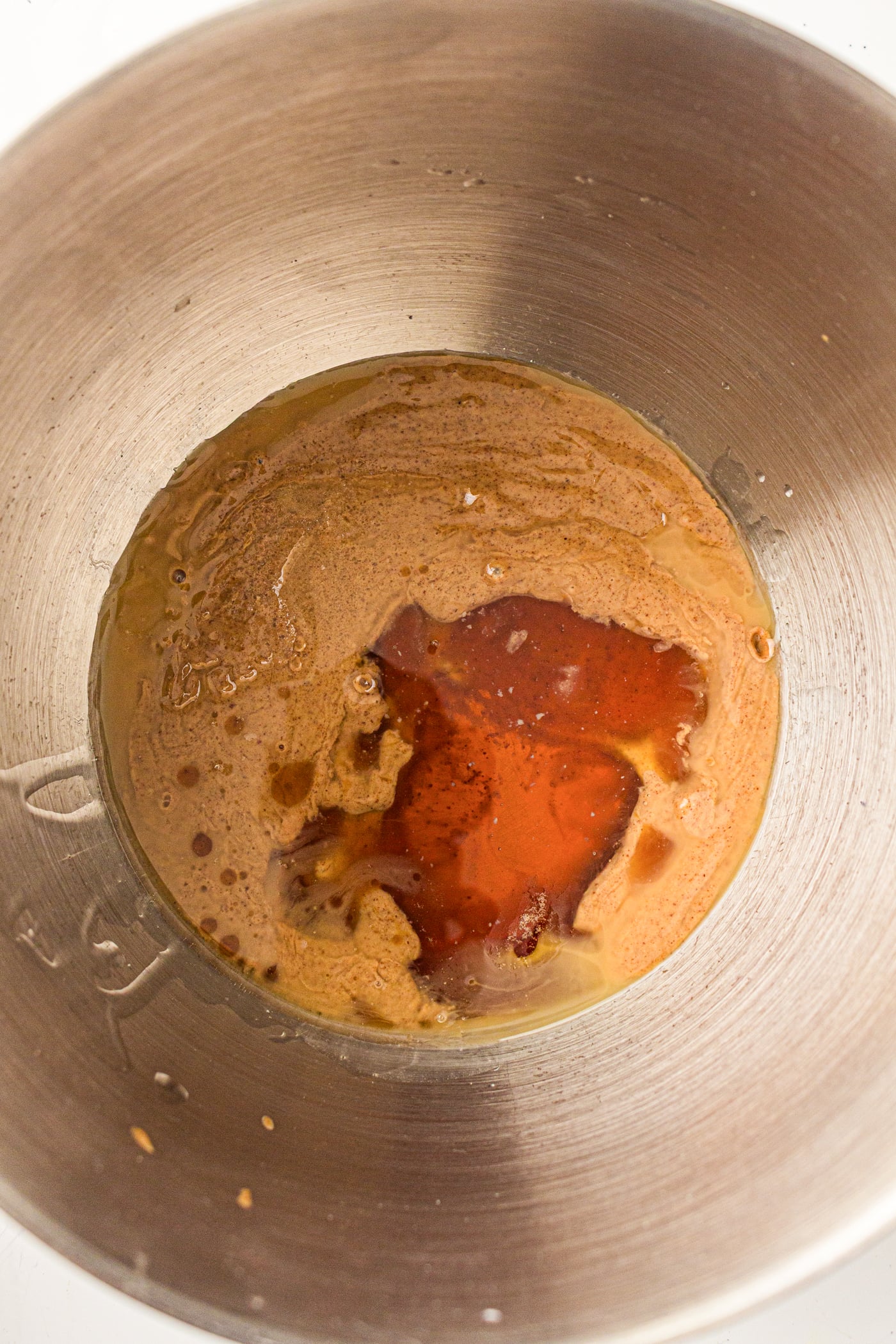 almond lour and maple syrup in a bowl