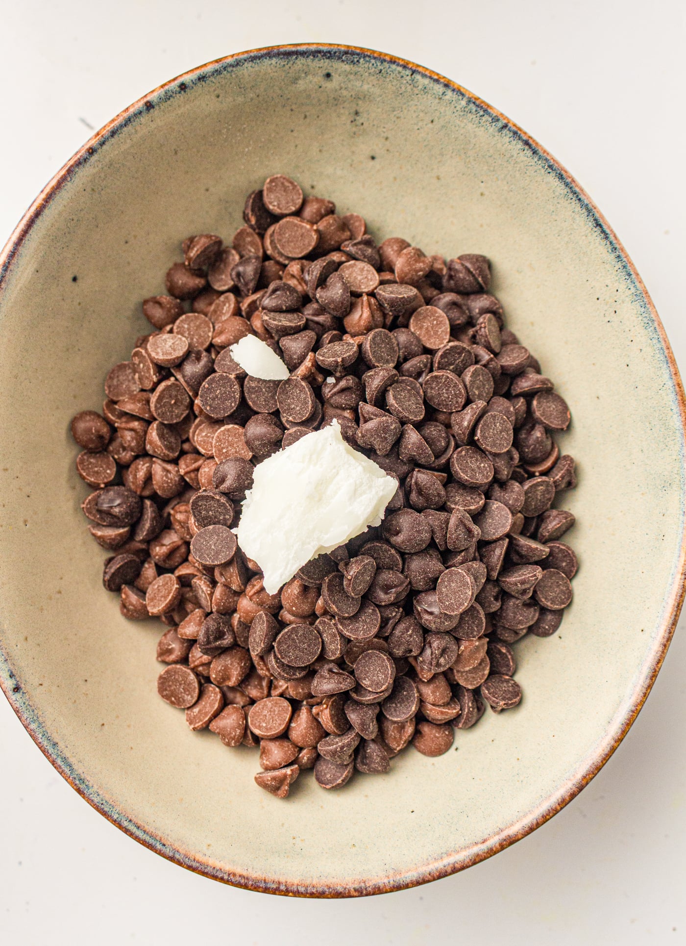 chocolate chips and coconut oil in a bowl