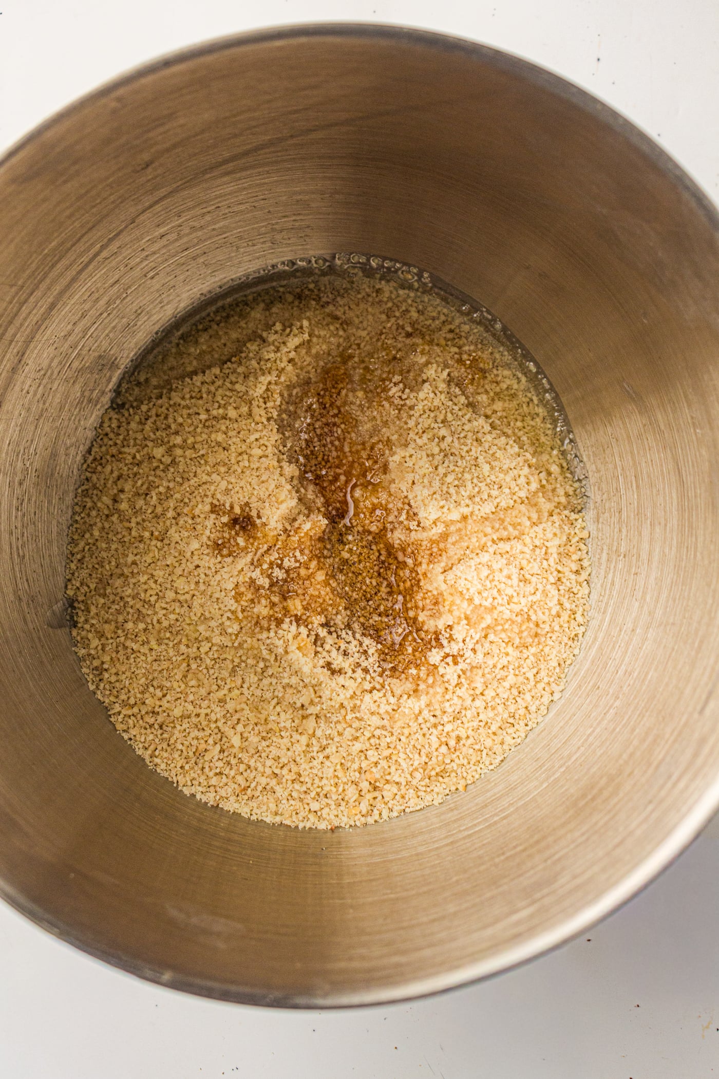 maple syrup and almond flour ina. bowl