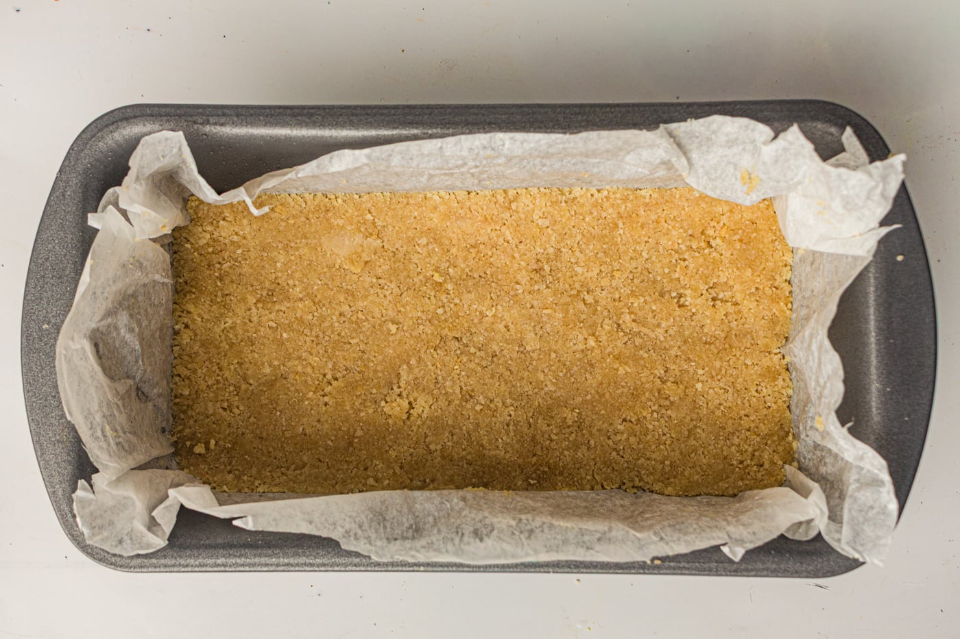 almond flour mix in a parchment paper lined pan