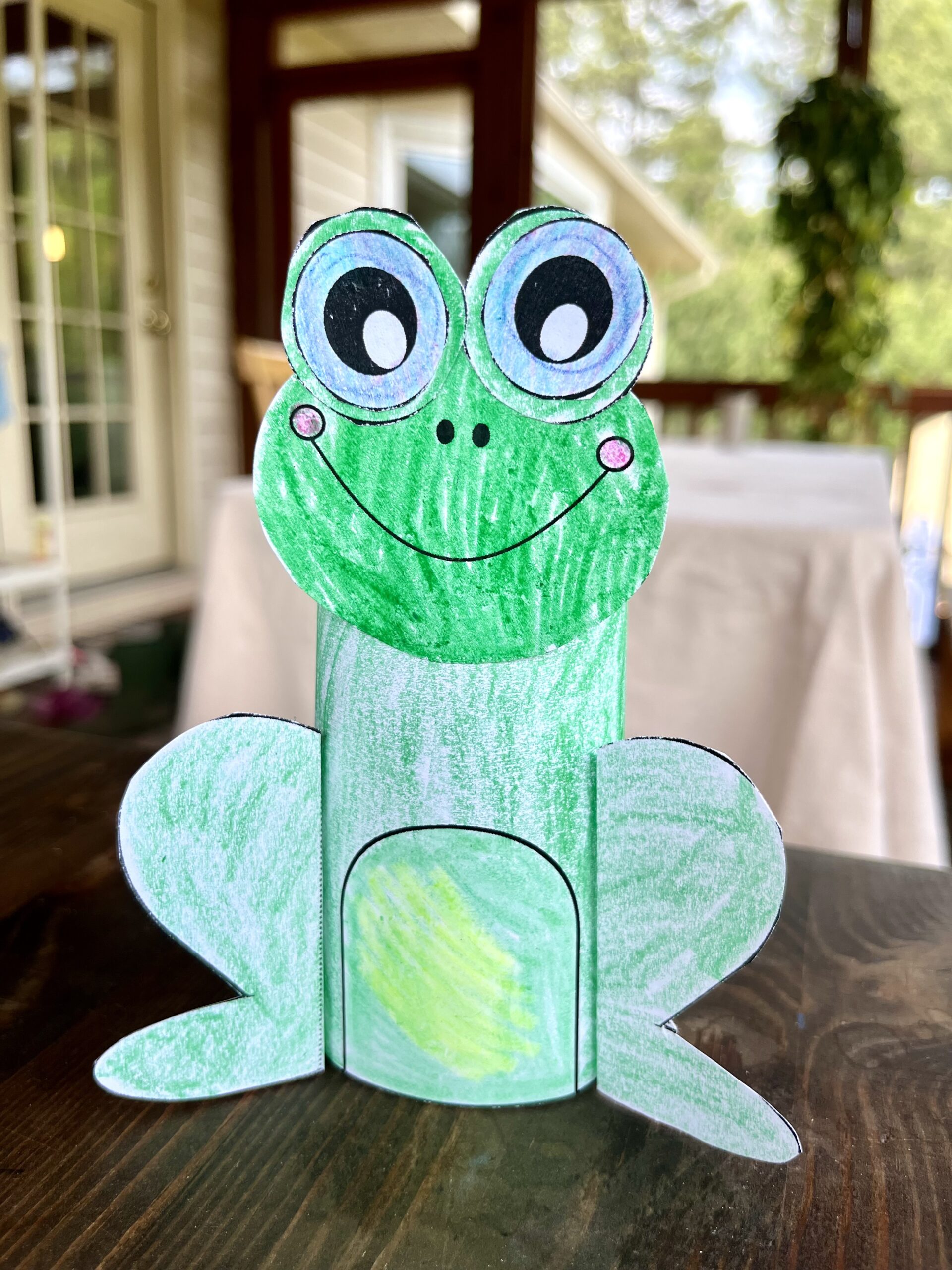 a completed 3d paper frog craft for ids